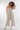 Magasinez la combinaison à dos ouvert de la nouvelle collection de la Boutique Colori - Shop the open back jumpsuit from new collection from Boutique Colori