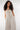 Magasinez la combinaison à dos ouvert de la nouvelle collection de la Boutique Colori - Shop the open back jumpsuit from new collection from Boutique Colori