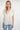 Magasinez la blouse rayée à manches courtes de Colori - Shop the short sleeve striped blouse from Colori