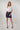 Magasinez la blouse courte à manches courtes de Colori - Shop the crop short sleeve blouse from Colori