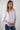 Magasinez la blouse rayée à manches trois-quarts de Colori - Shop the striped three-quarter sleeve blouse from Colori