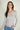 Magasinez le chandail à col en V de Colori - Shop the V-neck sweater from Colori