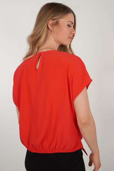 Magasinez le haut à nouer à l'avant de Colori - Shop the tie-front top from Colori