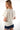 Magasinez le haut à manches courtes de Colori - Shop the short-sleeve top from Colori