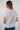 Magasinez le haut à col en V et manches courtes de Colori - Shop the short sleeve V-neck top from Colori