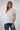 Magasinez le haut à col en V et manches courtes de Colori - Shop the short sleeve V-neck top from Colori