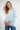Magasinez le haut à manches chauve-souris de Colori - Shop the batwing sleeve top from Colori