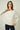 Magasinez le haut à manches chauve-souris de Colori - Shop the batwing sleeve top from Colori