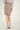 Magasinez la jupe courte à coupe droite de Colori - Shop the short straight skirt from Colori
