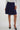 Magasinez la jupe courte plissée de Colori - Shop the mini pleated skirt from Colori