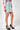 Magasinez la jupe courte à coupe droite de Colori - Shop the straight-cut mini skirt from Colori