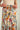 Magasinez la jupe midi fleurie à volants de Colori - Shop the floral ruffle midi skirt from Colori