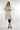 Magasinez le manteau long à détail de fourrure de Colori - Shop the long coat with fur detail from Colori