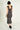 Magasinez la robe midi brillante de Colori - Shop the shiny midi dress from Colori