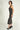 Magasinez la robe midi brillante de Colori - Shop the shiny midi dress from Colori