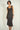 Magasinez la robe midi brillante de Colori - Shop the shiny midi dress from Colori
