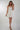 Magasinez la robe mini avec haut élastique de Colori - Shop the elastic top mini dress from Colori