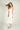 Magasinez la robe midi côtelée de Colori - Shop the ribbed midi dress from Colori