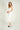 Magasinez la robe midi côtelée de Colori - Shop the ribbed midi dress from Colori