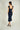 Magasinez la robe midi brillante de Colori - Shop the shiny midi dress from Colori