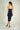 Magasinez la robe portefeuille brillante de Colori - Shop the shiny wrap dress from Colori