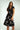 Magasinez la robe cache-coeur fleurie de Colori - Shop the floral wrap dress from Colori
