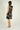 Magasinez la robe cache-coeur sans manches de Colori - Shop the sleeveless wrap dress from Colori