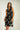 Magasinez la robe cache-coeur sans manches de Colori - Shop the sleeveless wrap dress from Colori