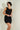 Magasinez la robe brillante froncée de Colori - Shop the shiny ruched dress from Colori