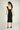 Magasinez la robe midi brillante de Colori - Shop the shiny midi dress from Colori