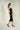 Magasinez la robe midi brillante de Colori - Shop the shiny midi dress from Colori