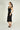 Magasinez la robe midi brillante de Colori - Shop the shiny midi dress from Colori