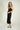 Magasinez la robe midi côtelée de Colori - Shop the ribbed midi dress from Colori