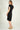 Magasinez la robe portefeuille à manches courtes de Colori - Shop the short sleeve wrap dress from Colori