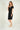 Magasinez la robe portefeuille à manches courtes de Colori - Shop the short sleeve wrap dress from Colori