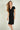 Magasinez la robe portefeuille à manches courtes de Colori - Shop the short sleeve wrap dress from Colori