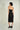 Magasinez la robe portefeuille brillante de Colori - Shop the shiny wrap dress from Colori