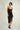 Magasinez la robe portefeuille brillante de Colori - Shop the shiny wrap dress from Colori