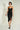 Magasinez la robe portefeuille brillante de Colori - Shop the shiny wrap dress from Colori