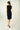 Magasinez la robe portefeuille sans manches de Colori - Shop the sleeveless wrap dress from Colori