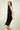 Magasinez la robe portefeuille sans manches de Colori - Shop the sleeveless wrap dress from Colori
