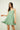 Magasinez la robe courte évasée de Colori - Shop the short flared dress from Colori