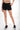 Magasinez le short en denim de Colori - Shop the denim short from Colori