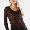 Magasinez le haut en dentelle à manches longues de la nouvelle collection de la Boutique Colori - Shop the long-sleeved lace top from new collection from Boutique Colori
