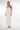 Magasinez la robe élégante à dos ouvert de la nouvelle collection de la Boutique Colori - Shop the elegant dress with open back from new collection from Boutique Colori