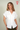 Magasinez la blouse à manches courtes de Colori - Shop the short sleeves blouse from Colori