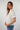 Magasinez la blouse blanche à manches courtes de Colori - Shop the white short sleeves blouse from Colori