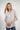 Magasinez la blouse rayée à manches trois-quarts de Colori - Shop the striped three-quarter sleeve blouse from Colori