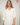 Magasinez la blouse col en V et manches trois-quarts de Colori - Shop the V-neck and three-quarter sleeves blouse from Colori