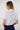 Magasinez la blouse courte à manches courtes de Colori - Shop the crop short sleeve blouse from Colori